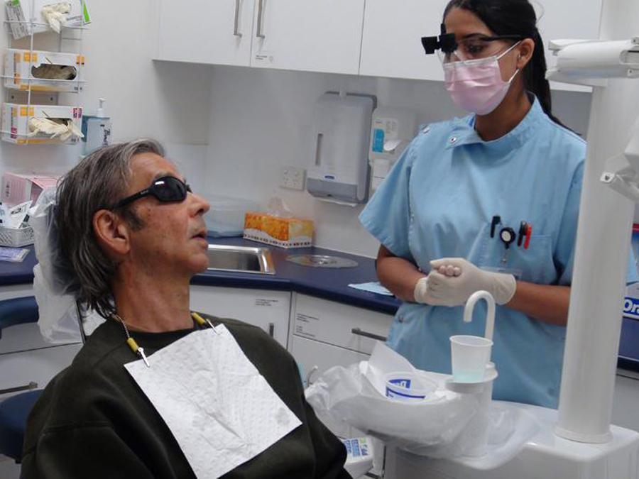 Student with Dental Research and Education Fund patient