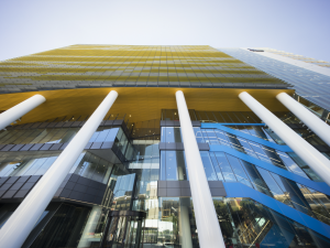 Outside view of the AHMS building, looking up to the sky