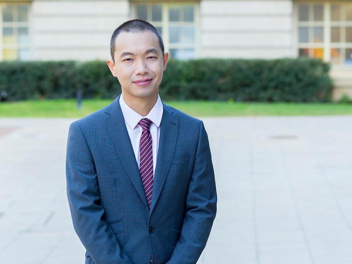 Portrait of Jonathon Yong, standing outside Barr Smith library